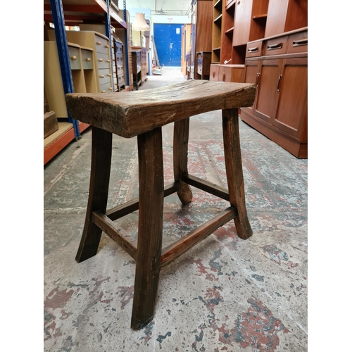 478 - A rustic oak farmhouse stool