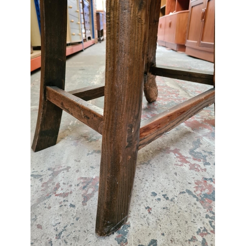 478 - A rustic oak farmhouse stool