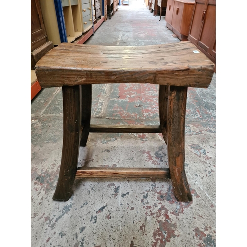 478 - A rustic oak farmhouse stool