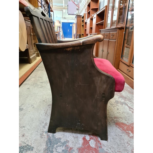 482 - An oak church pew style hall chair with red upholstery