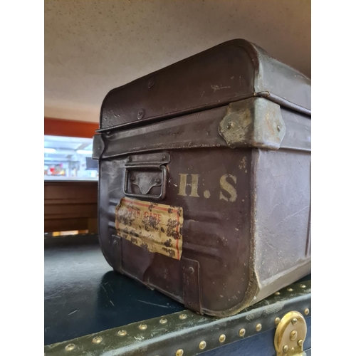 485 - Two items to include an early 20th century blue steamer trunk and a vintage brown metal travel chest... 