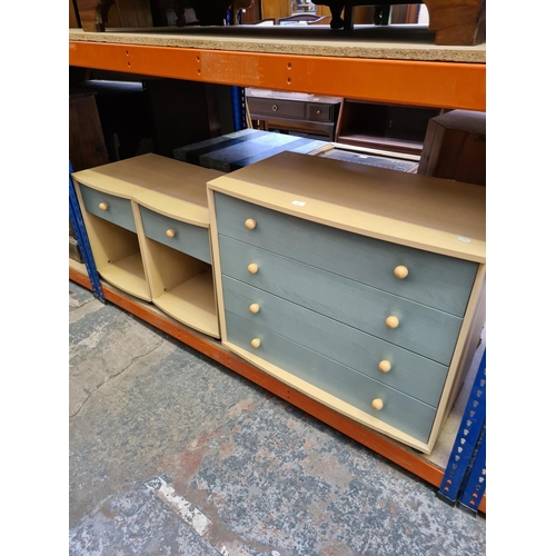 497 - A modern beech effect and sage green chest of four drawers and two matching single drawer bedside ca... 