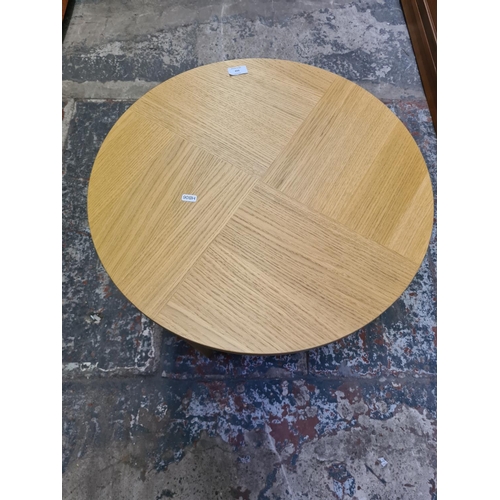 499 - An Ikea Vejmon oak effect two tier circular side table - ref no. 18633