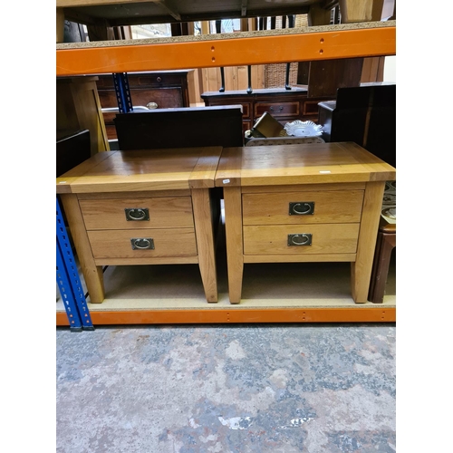 501 - A pair of modern oak square bedside tables with single drawer