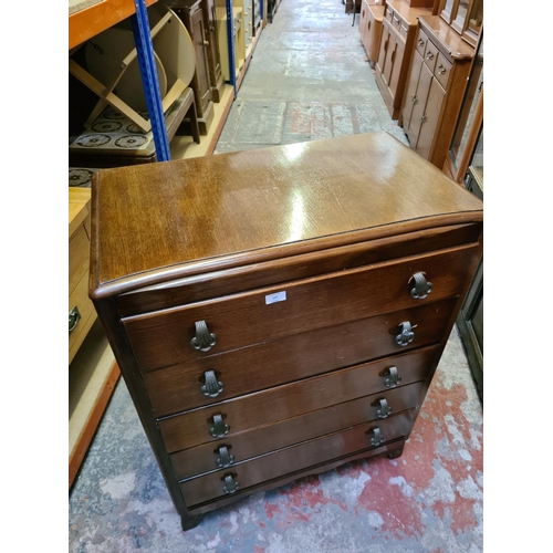 503 - An Art Deco oak chest of five drawers