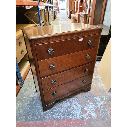 504 - An Art Deco oak chest of four drawers