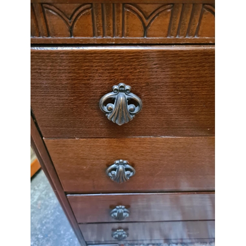 504 - An Art Deco oak chest of four drawers