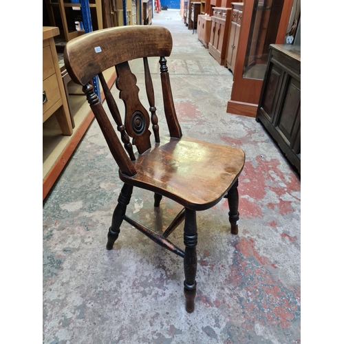 506 - A pair of Victorian style oak farmhouse dining chairs