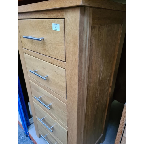 529 - A modern oak chest of five drawers