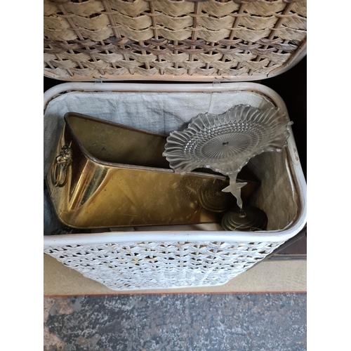 531 - A vintage wicker laundry basket containing various items to include Art Deco style chrome pedestal d... 