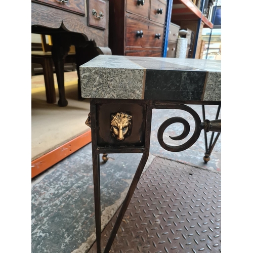 536 - A contemporary marble effect square side table on black and gold painted wrought iron base with lion... 