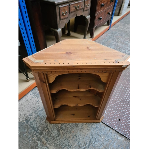 538 - A pine wall mountable corner cabinet