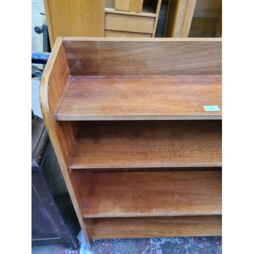 546 - A vintage plywood four tier freestanding bookcase