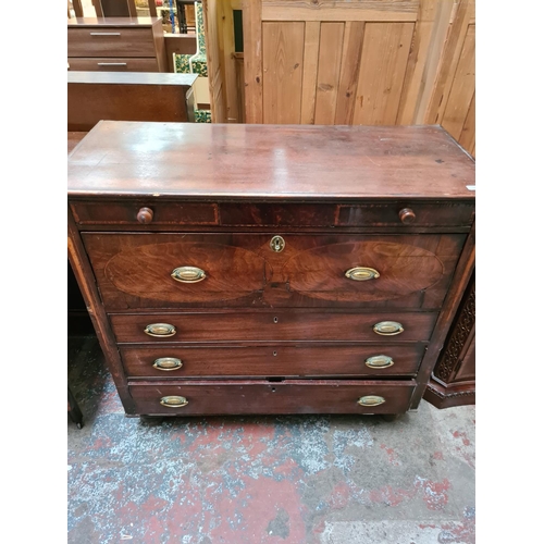 558 - A Regency mahogany secretaire chest of drawers with upper fall front writing slope and internal stor... 