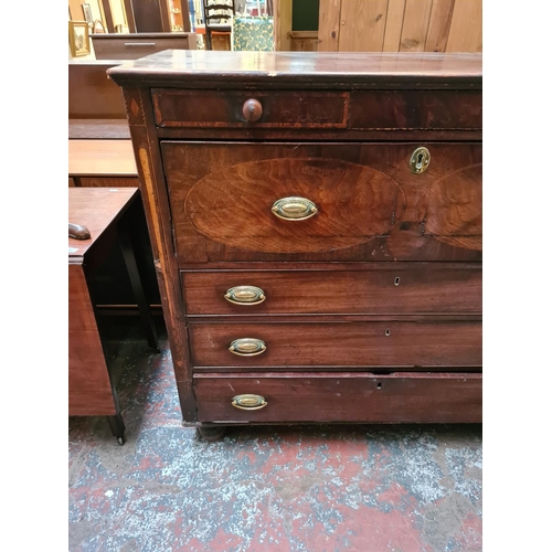 558 - A Regency mahogany secretaire chest of drawers with upper fall front writing slope and internal stor... 