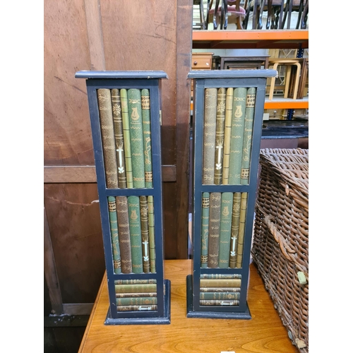 580 - Two modern CD cabinets in the form of bookcases