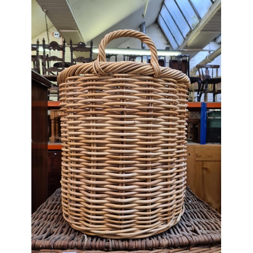 581 - Three various wicker baskets