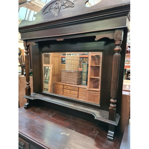 589 - An Edwardian mahogany mirrored back sideboard with corinthian column supports, Art Nouveau type hand... 