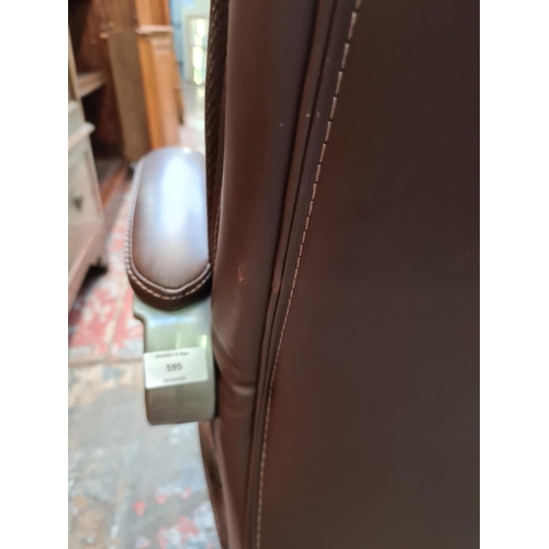 595 - A good quality modern brown leather swivel office desk chair