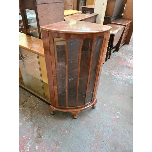 601 - Two items to include a mid 20th century walnut and beech bookcase with two glass sliding doors and t... 