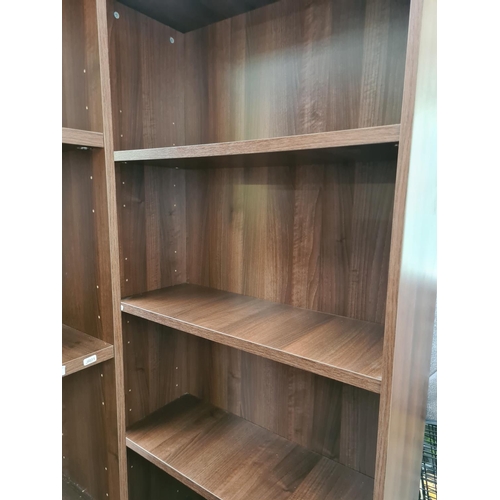 604 - Three items to include a pair of modern walnut effect five tier freestanding bookcases - both measur... 