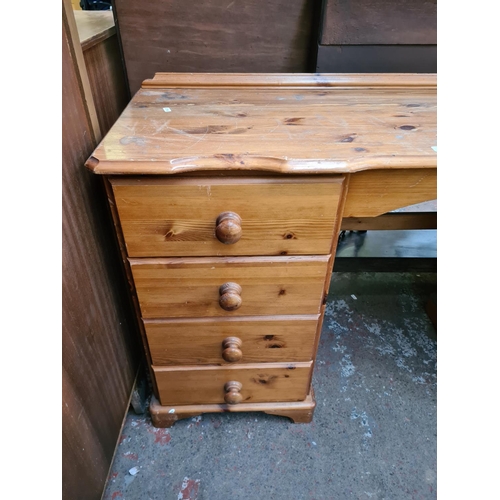 608 - A modern pine dressing table with eight drawers (see condition report)