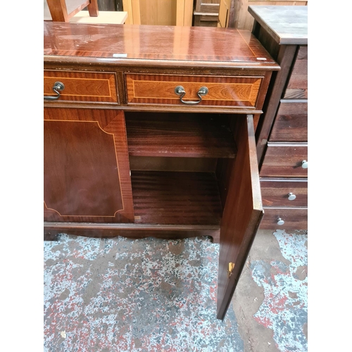 613 - An antique style mahogany effect small sideboard with two drawers and two doors