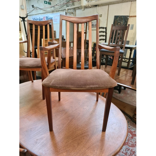 624 - A 1970s G Plan Fresco teak extending dining table and six matching chairs