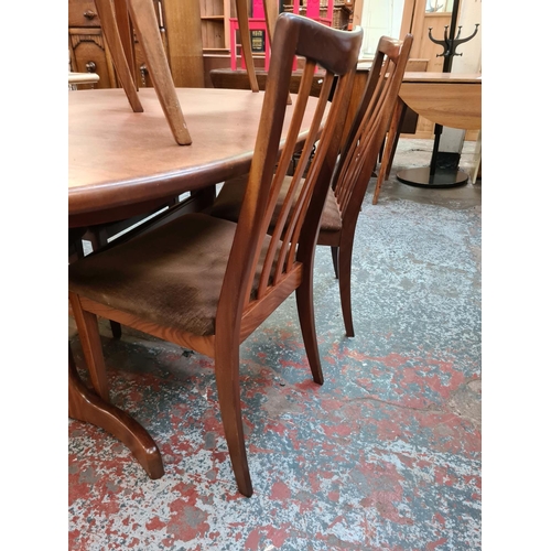 624 - A 1970s G Plan Fresco teak extending dining table and six matching chairs