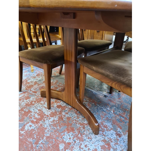 624 - A 1970s G Plan Fresco teak extending dining table and six matching chairs