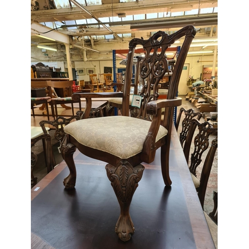 638 - An impressive Chippendale style mahogany extending refectory dining table with six matching dining c... 