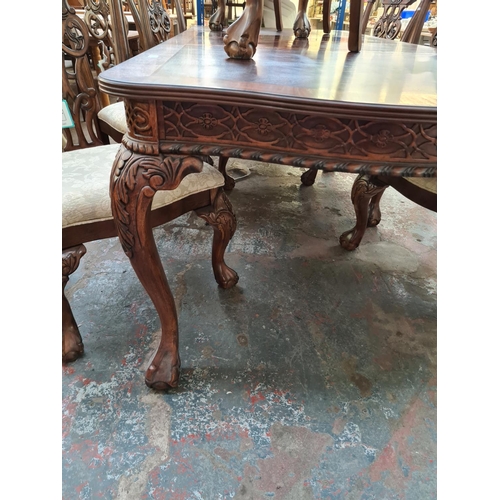 638 - An impressive Chippendale style mahogany extending refectory dining table with six matching dining c... 