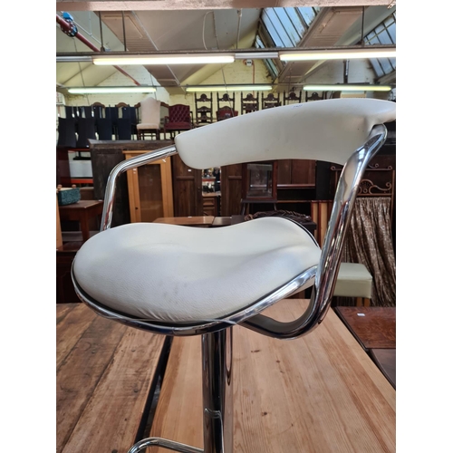 639 - Two modern white leatherette and chrome bar stools