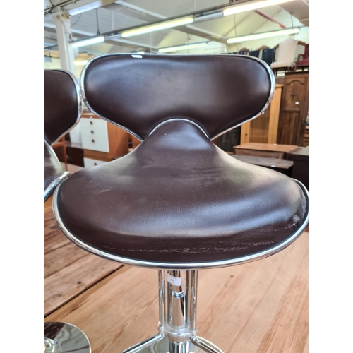 641 - Two modern brown leatherette and chrome bar stools (see condition report)