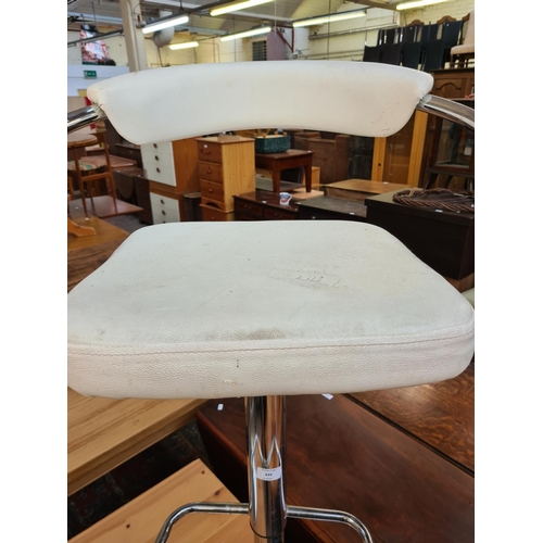 642 - Two modern white leatherette and chrome bar stools