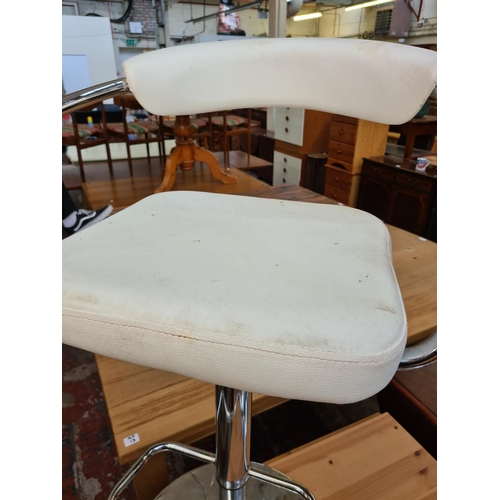 642 - Two modern white leatherette and chrome bar stools