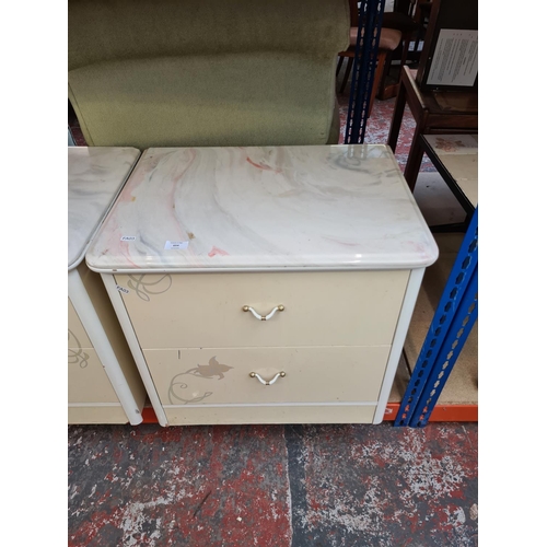 654 - A pair of white laminate two drawer bedside cabinets