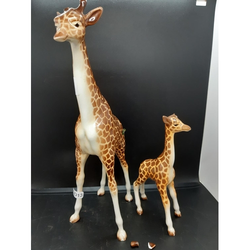 97 - Two Beswick giraffe figurines to include one large and one baby - model no. 1631 and 853 (see condit... 