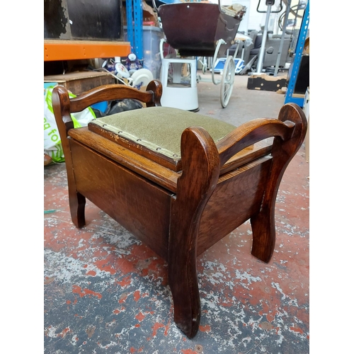 298 - A vintage oak piano stool with green upholstered seat and contents and a small mahogany framed foots... 