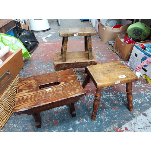 299 - Four vintage and antique wooden stools