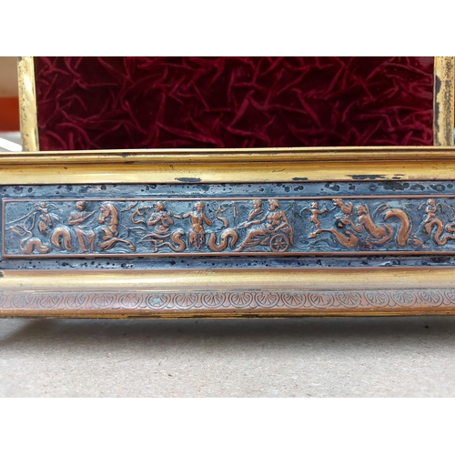 303 - A vintage Elkington & Co. brass and copper glove box depicting putti, swan and Greek scenes and red ... 