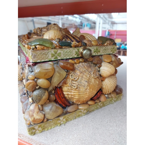 304 - A vintage handmade beech comber box with various shells, glass, driftwood, tiles etc. - measuring ap... 