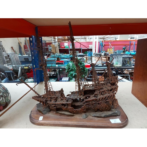 321 - An unusual metal sculpture of of a shipwreck titled ‘Revenge’ measuring approx. 43cm long and 43cm h... 