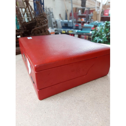 324 - Two items to include a red leather travel writing box and a Georgian mahogany writing slope