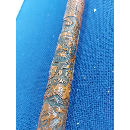 326 - A vintage oriental carved bamboo walking cane