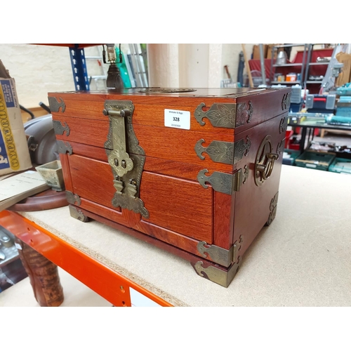 328 - An antique style oriental teak jewellery box with brass buckles, handles and corners with three inte... 