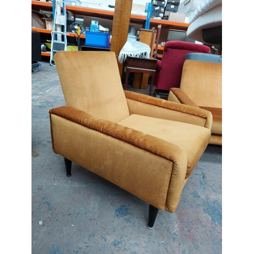 676 - A mid 20th century G Plan mustard upholstered four piece lounge suite comprising four seater sofa, t... 