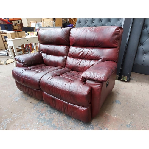 682 - A modern red leather reclining three piece lounge suite comprising three seater sofa, two seater sof... 