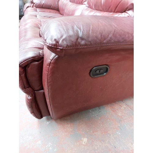 682 - A modern red leather reclining three piece lounge suite comprising three seater sofa, two seater sof... 