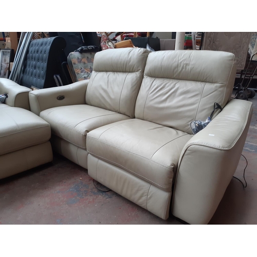 683 - A modern cream leather electric reclining two piece lounge suite comprising L-shaped corner sofa and... 